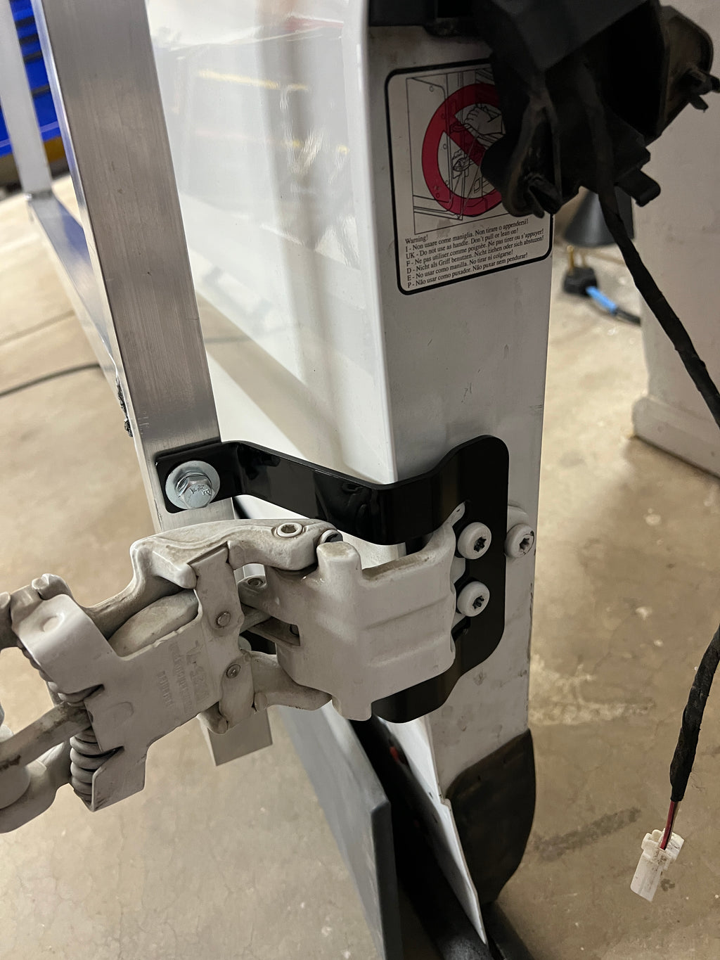 Ram Promaster passenger’s rear door mounting brackets