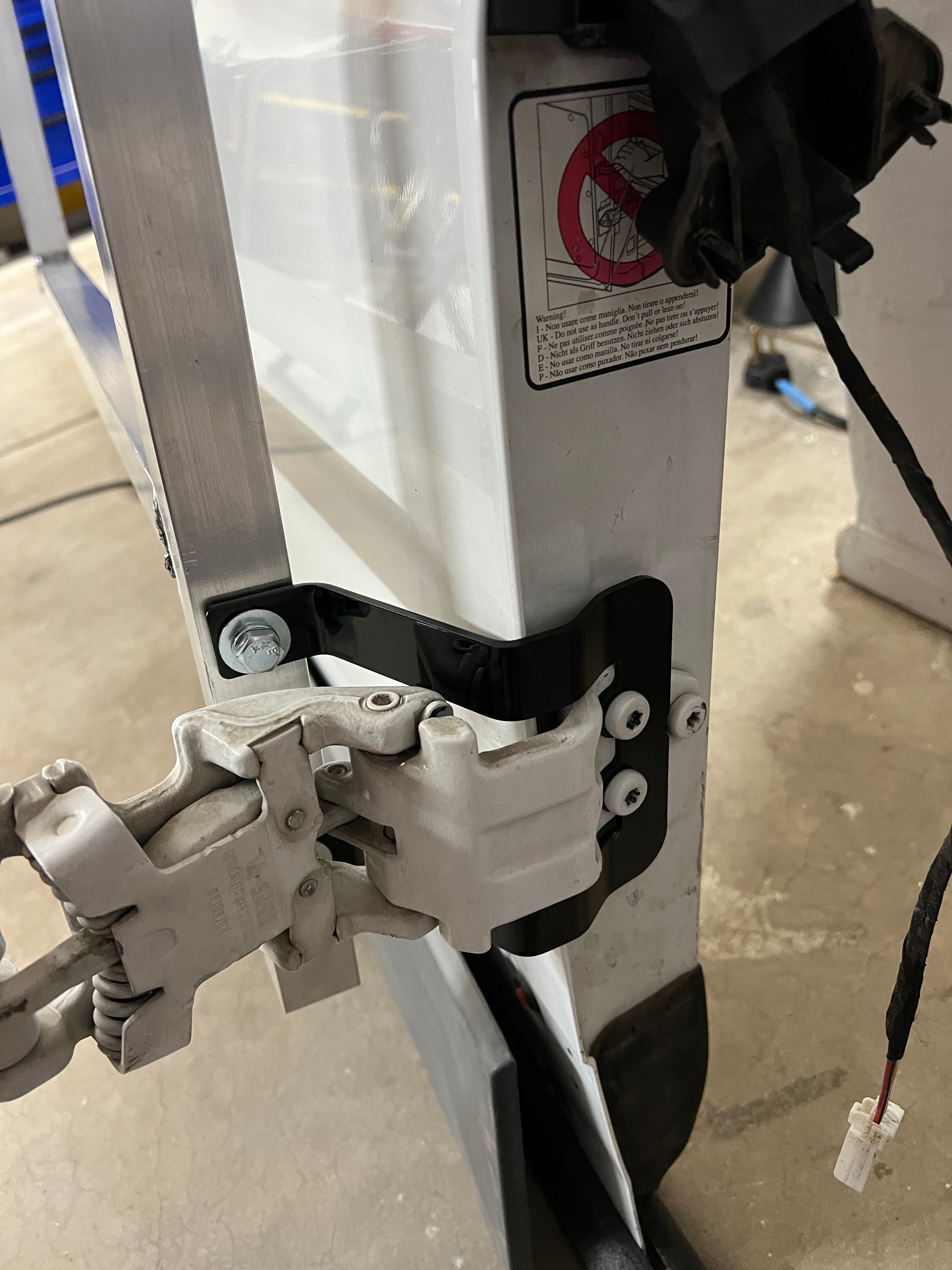 Ram Promaster passenger’s rear door mounting brackets