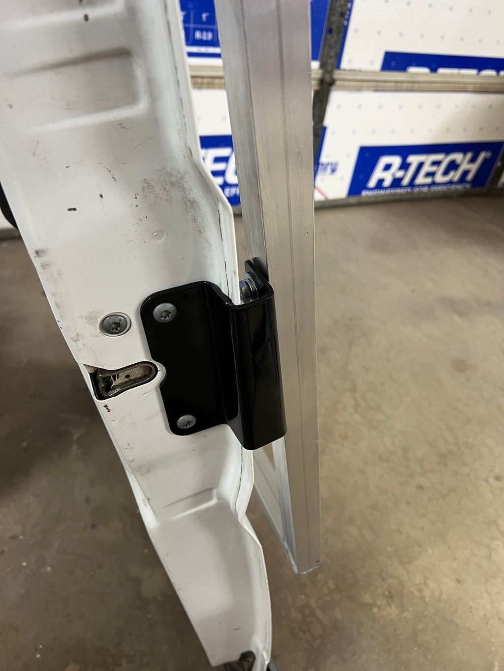 Ram Promaster passenger’s rear door mounting brackets