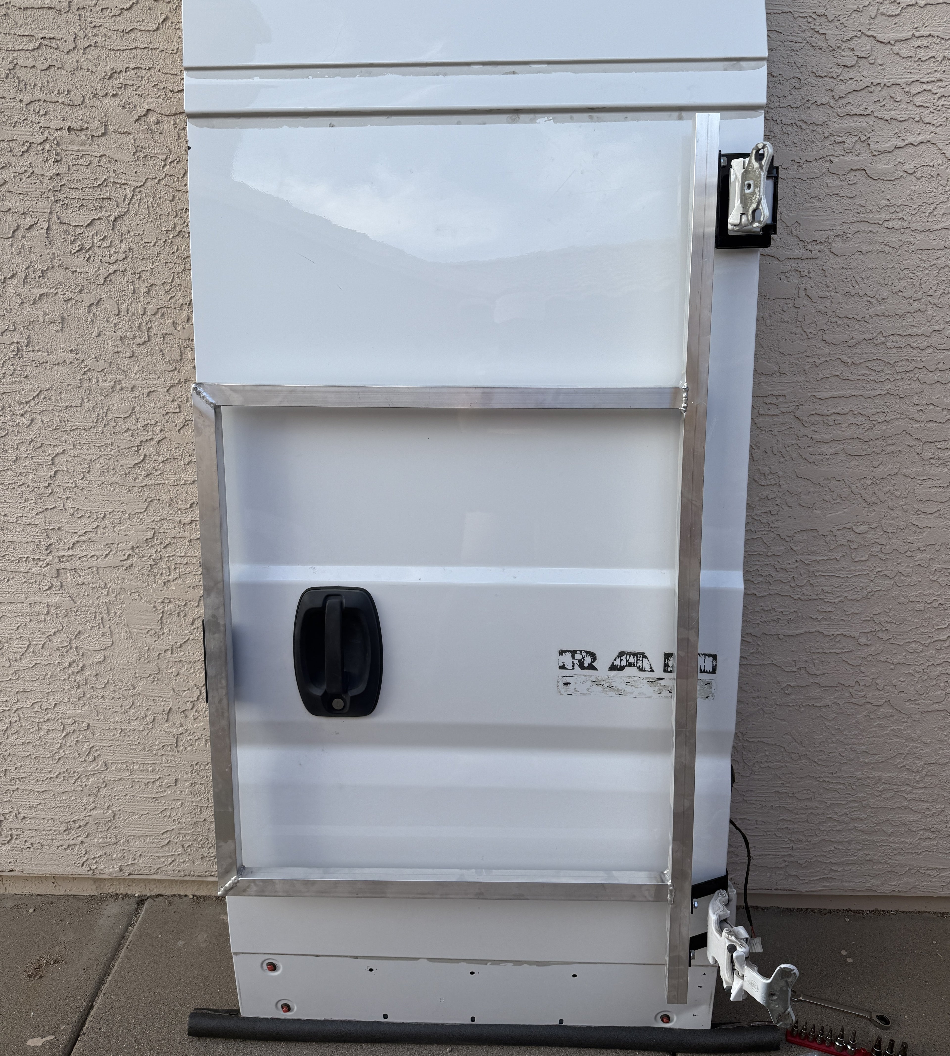 Ram Promaster passenger’s rear door mounting brackets