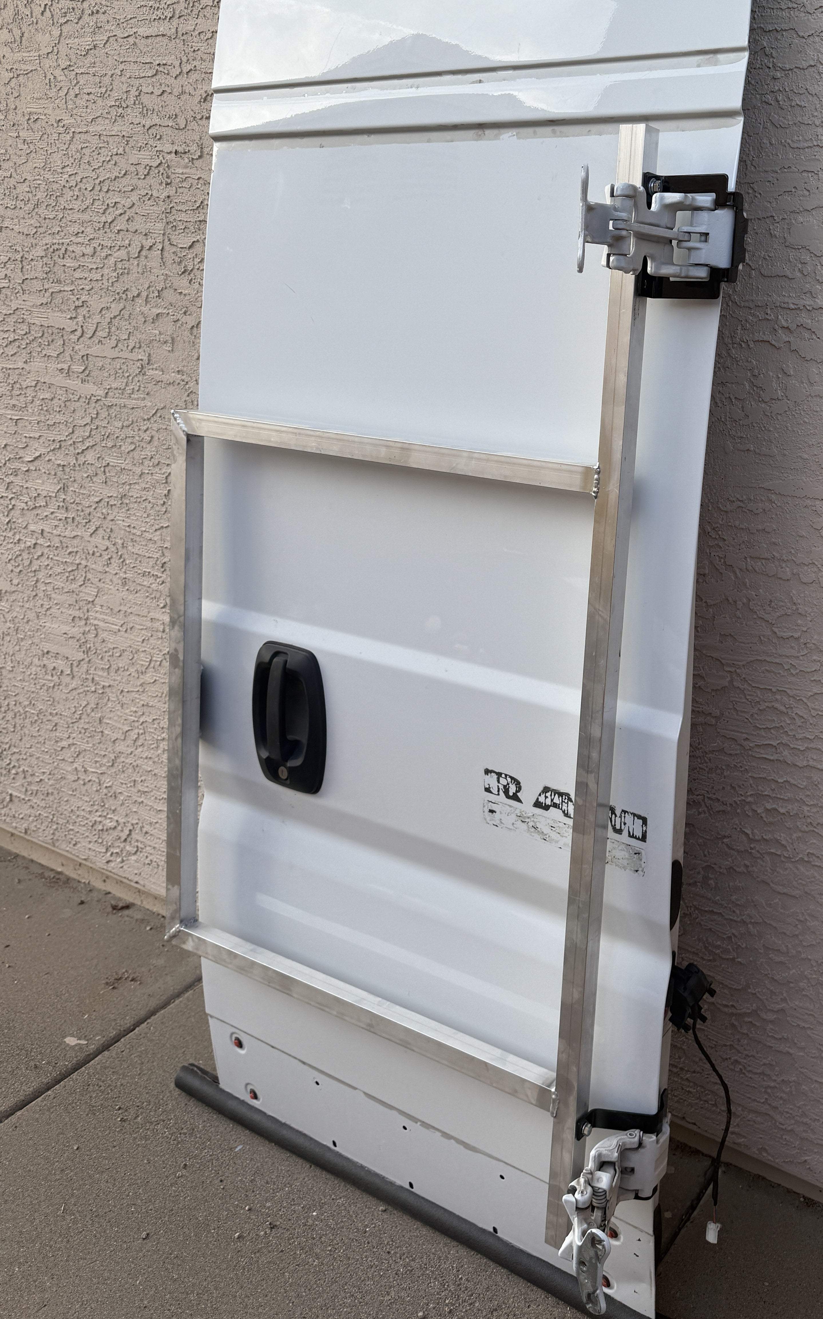 Ram Promaster passenger’s rear door mounting brackets